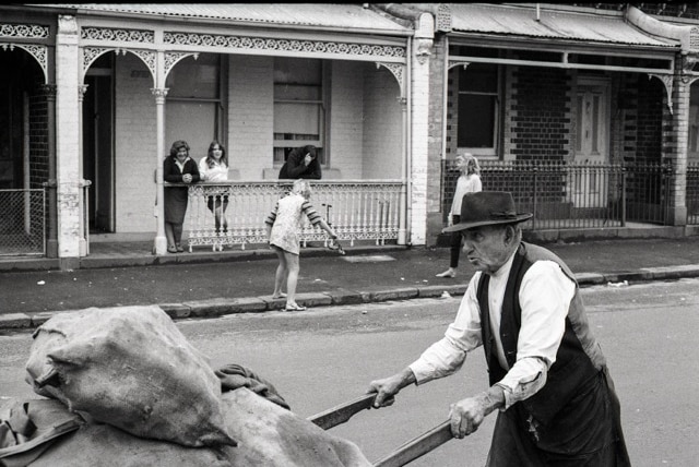 A 'bottlo' collecting bottles on Moor Street, Fitzroy.