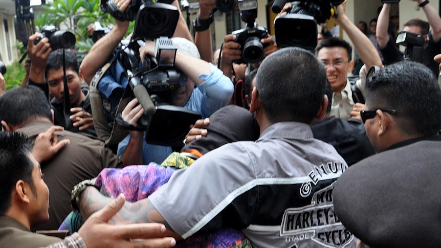 Facing jail: the teenager arrives at court in Bali earlier this month.
