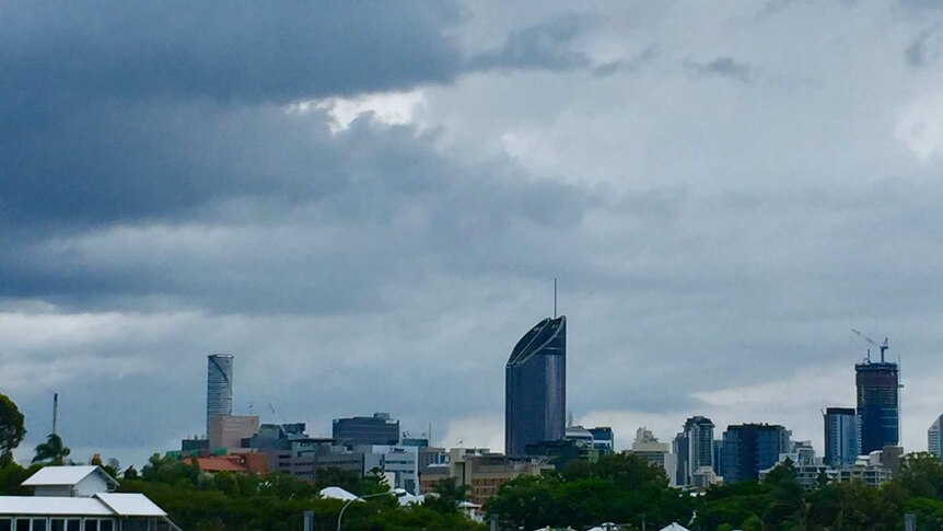 Storm clouds close in on Brisbane city on December 31, 2017.