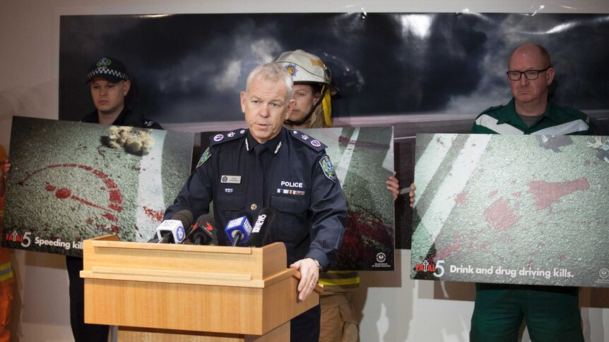 SA Police Commissioner Grant Stevens with other emergency services workers.