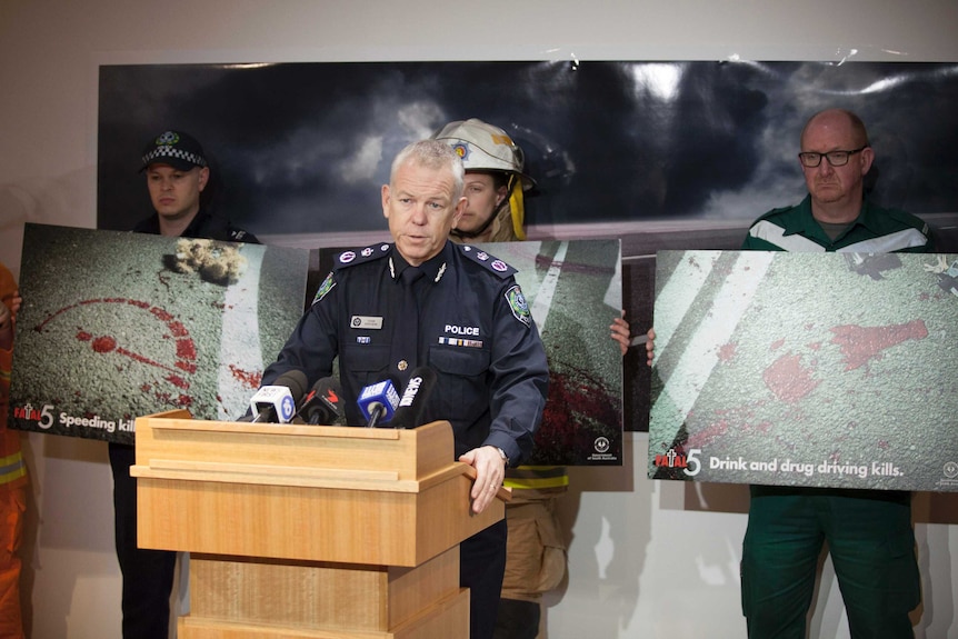 SA Police Commissioner Grant Stevens with other emergency services workers.