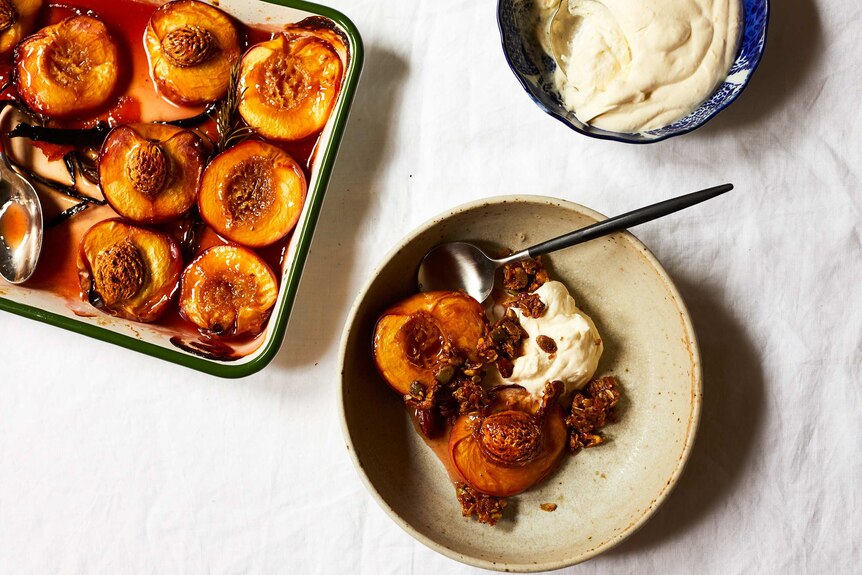 A tray of roast nectarines, bowl of lemon cream and a serving on the dessert, an easy summer dessert recipe.
