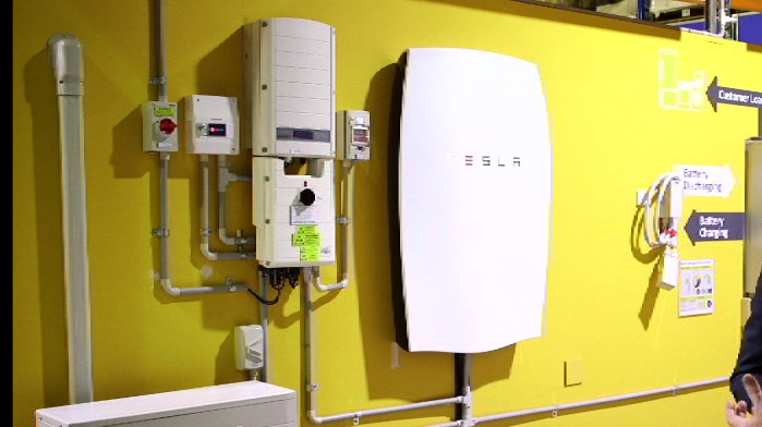 A battery storage room with a Tesla battery.
