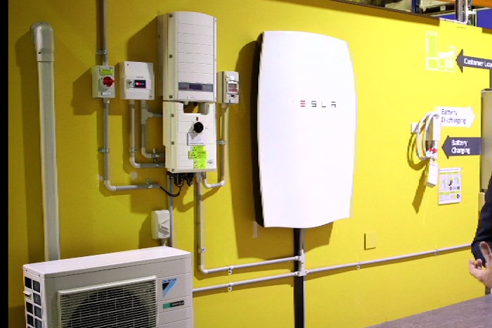 A battery storage room with a Tesla battery.