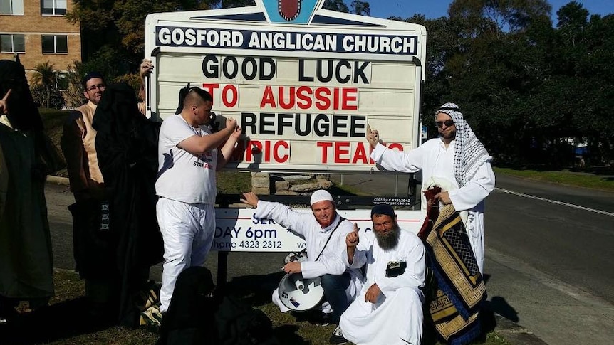 Members of the Party for Freedom group pose outside Gosford Anglican Church