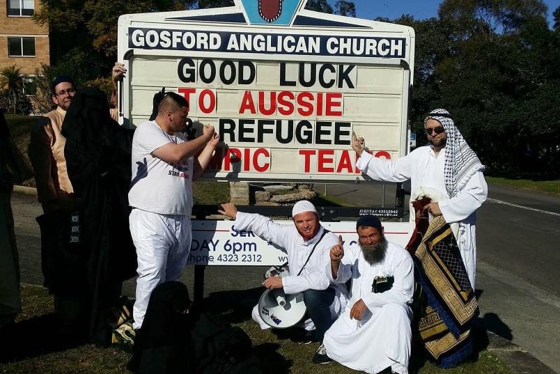 Members of the Party for Freedom group pose outside Gosford Anglican Church