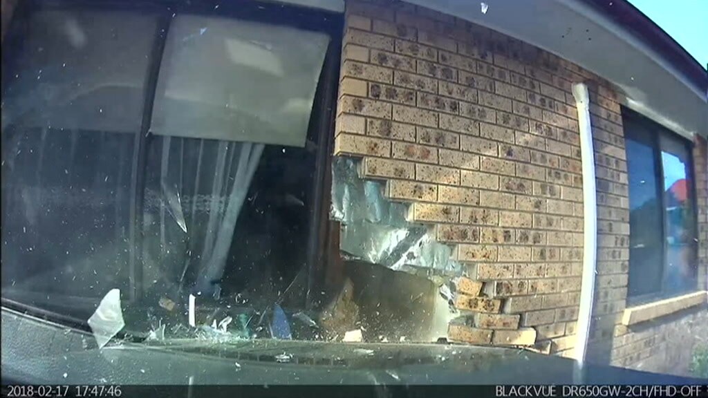 Dashcam footage shows speeding drunk driver crashing into house - ABC News