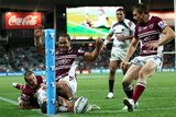 Steve Matai of Manly dropping his knees on Yow Yeh of Broncos