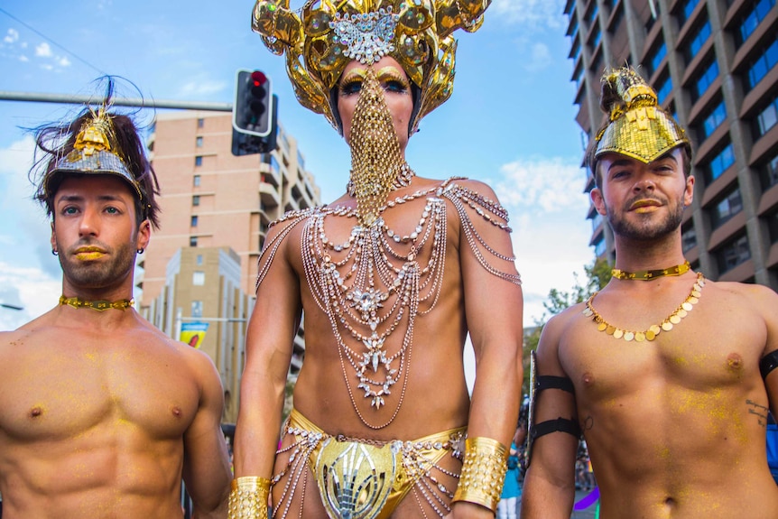 Men in gold celebrate Sydney's Mardi Gras 2019