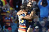 Eddie Betts celebrates a goal with Taylor Walker