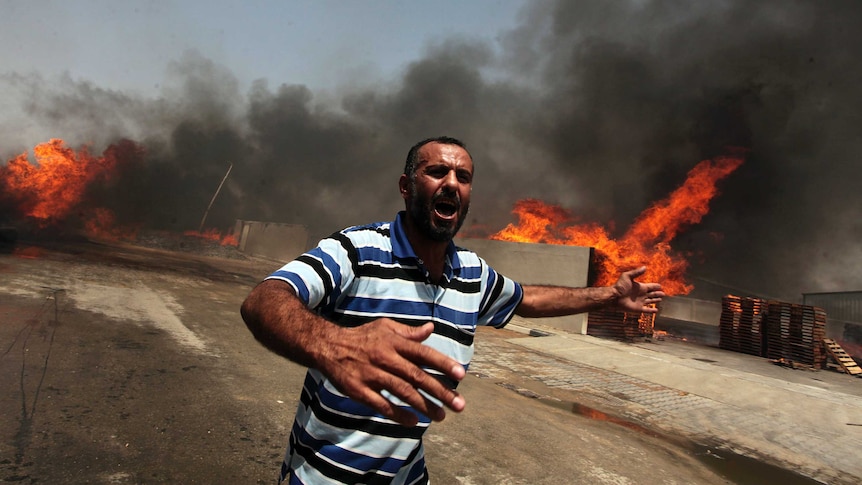Palestinians respond to tank fire police said was caused by Israeli shell
