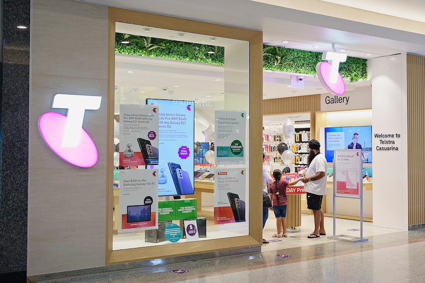 The shop front of a Telstra store in a shopping mall.