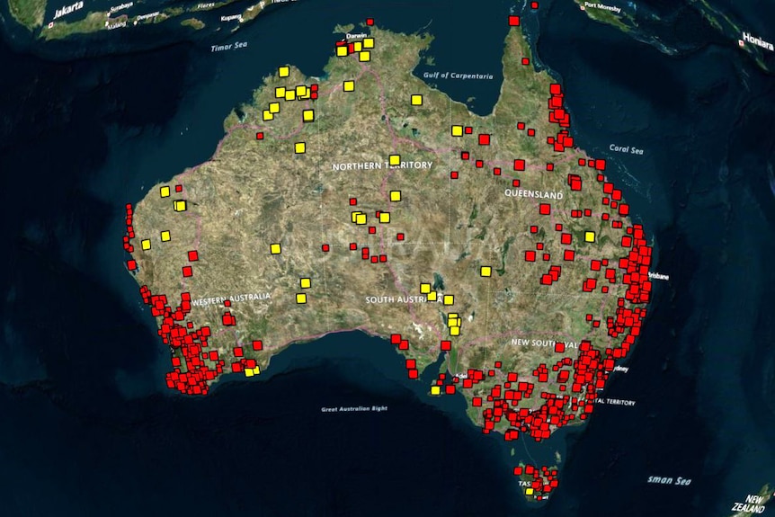 A map of Australia with red and yellow icons showing the locations of Mobile Black Spot Program-funded base stations.