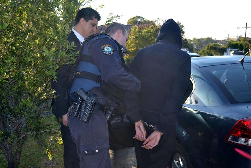 A member of Brothers 4 Life is arrested in Sydney over a murder and another shooting at Greenacre.