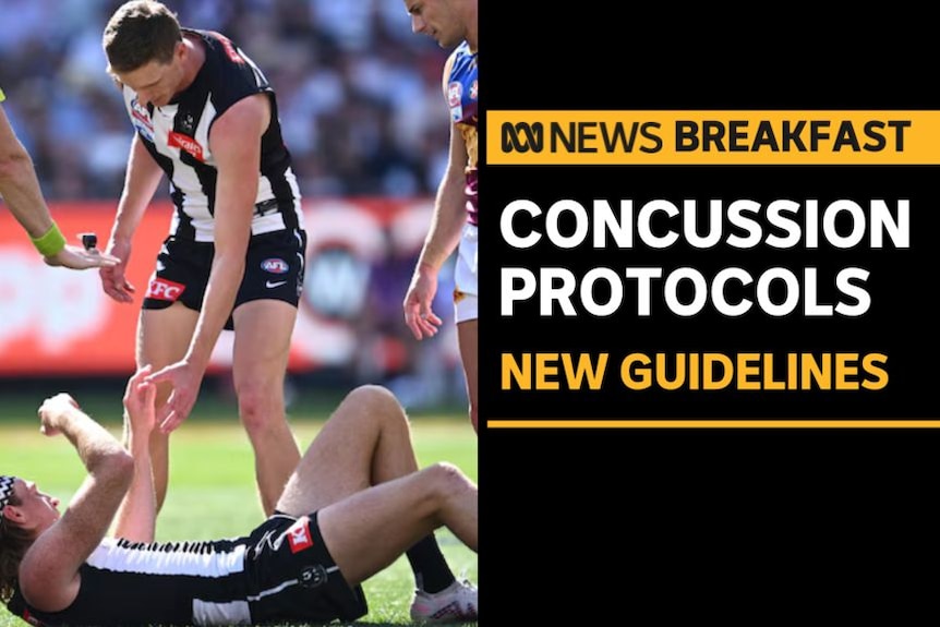 Concussion Protocols, New Guidelines: AFL player reaches down to a fallen teammate mid-match.