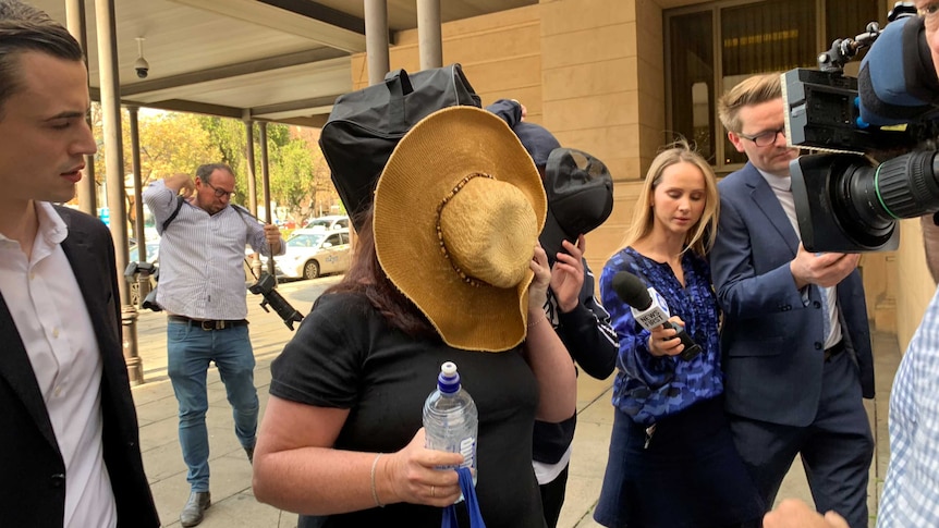 One of the teens of the Riverland school massacre threat leaves court after being released from custody