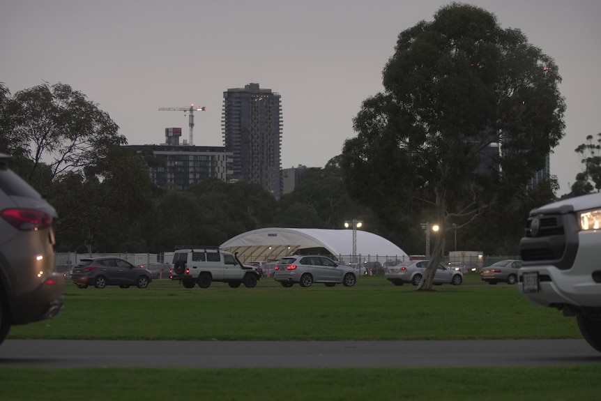 Cars lined up at a covid testing station