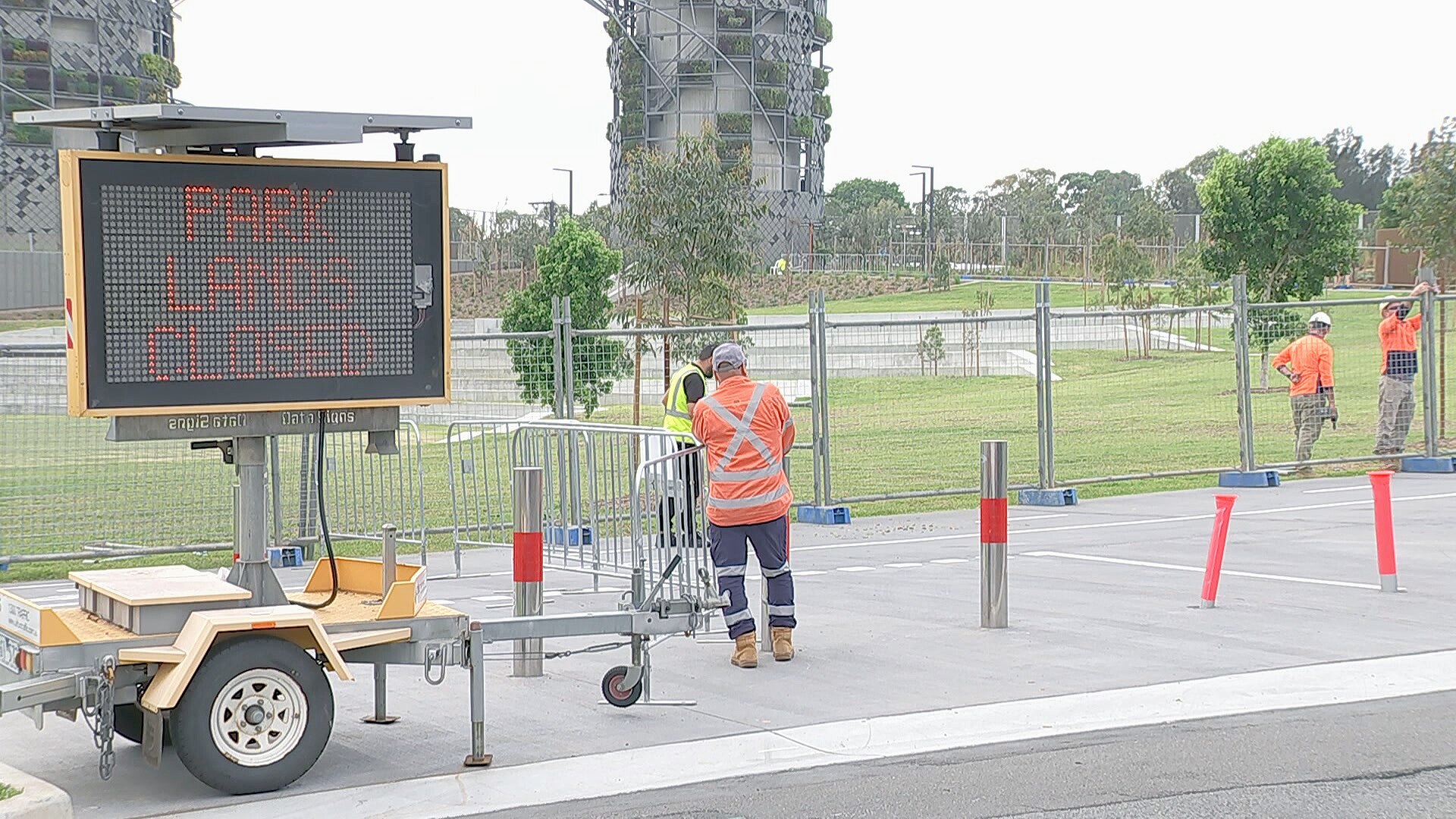 workers close off rozelle parklands after bonded asbestos was found in the organic mulch layed down in the playgorund