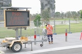 workers close off rozelle parklands after bonded asbestos was found in the organic mulch layed down in the playgorund