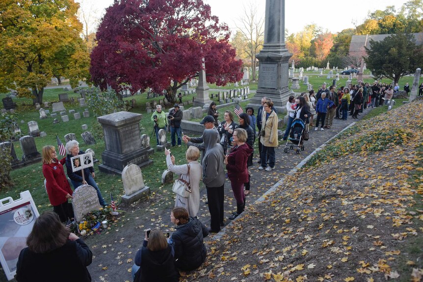 People line up to visit the grave of Susan B Anthony