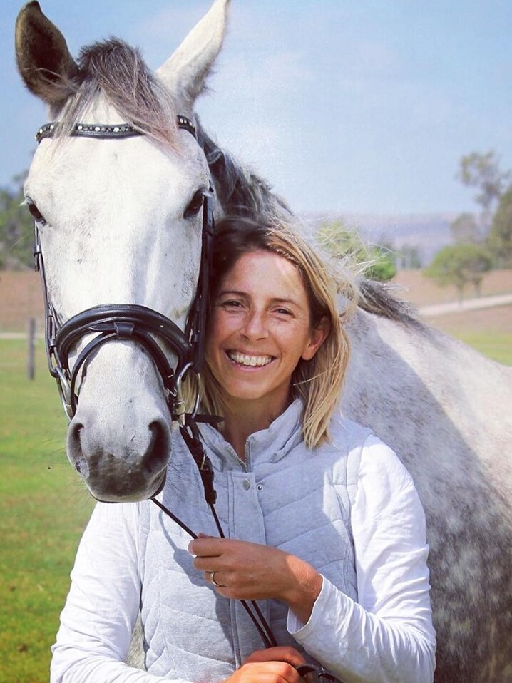 Linden Knight with her grey horse.