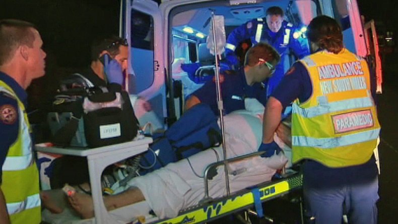A man is taken to hospital after losing his arm at Bar Beach.
