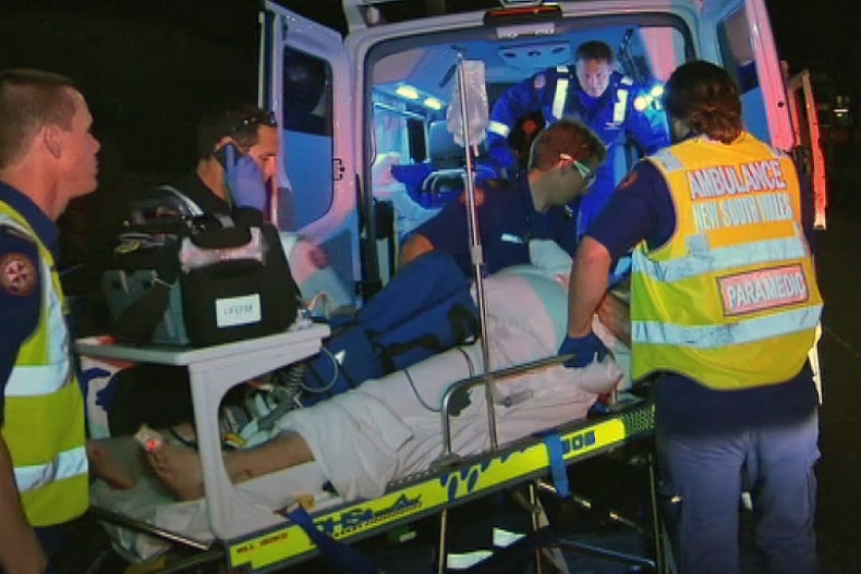 A man is taken to hospital after losing his arm at Bar Beach.