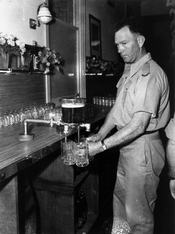 Soldiers  used a patented dispenser which eliminated heads on beers. It was a feature of the bar at the Brisbane Army Service.