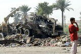 At least 60 people were killed when three car bombs exploded within minutes of each other in Iraq.