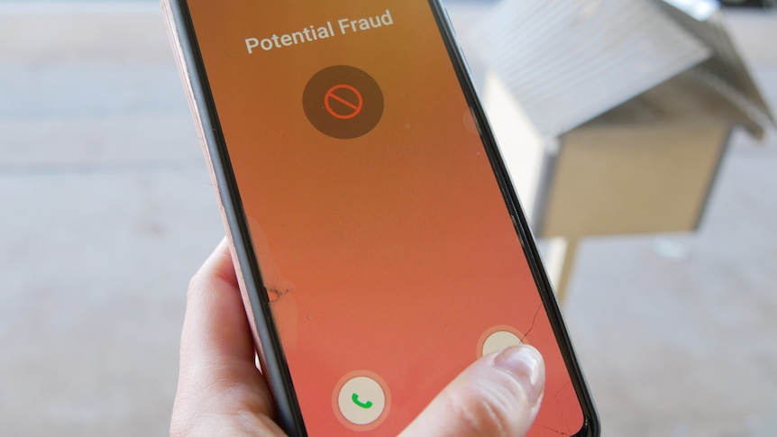 Potential fraud phone call on mobile screen