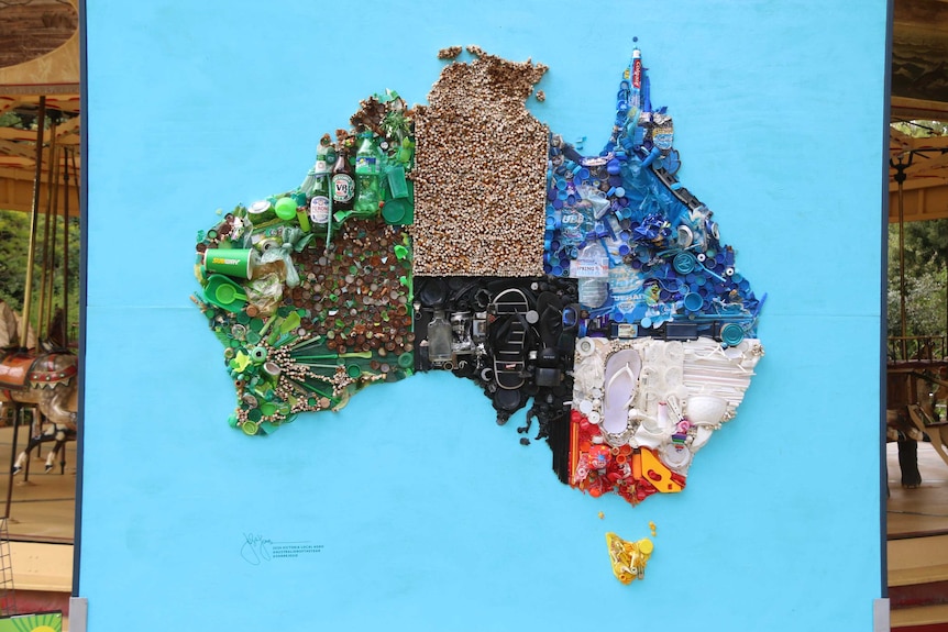 A large sculpture of Australia with each state and territory made from different kinds and colours of plastic.
