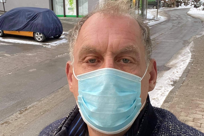 Photo of Kerry Hayes wearing a face mask in Austria.