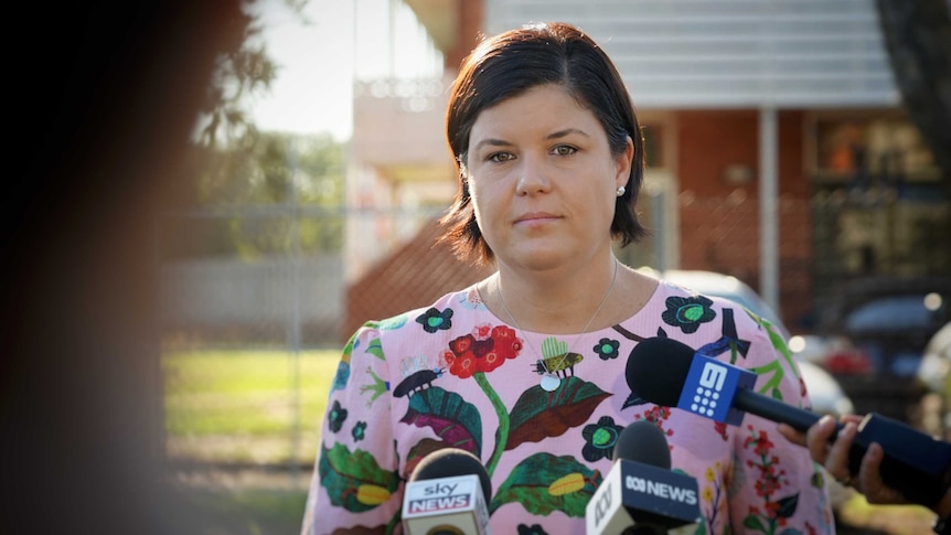 Natasha Fyles wearing a pink shirt.