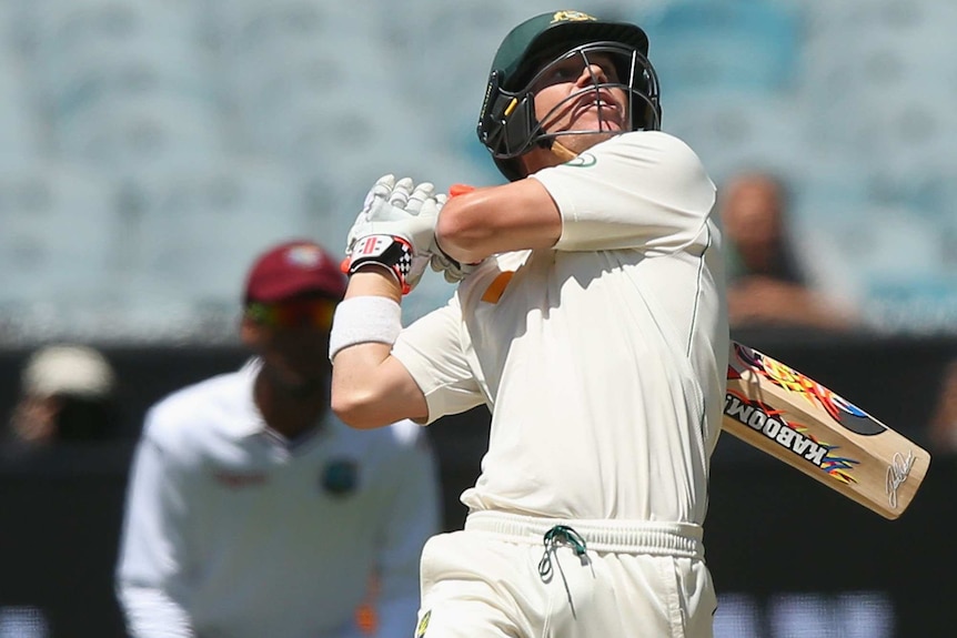 Australia's David Warner is dismissed on day one of the second Test against the West Indies at the MCG