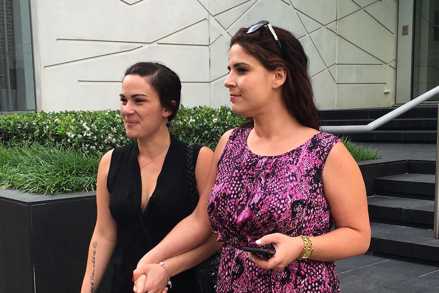 Gabrielle Pruiti (r) and Bec Gibb outside Supreme Court in Perth after guilty verdict handed down on brother's murder Michael Pruiti