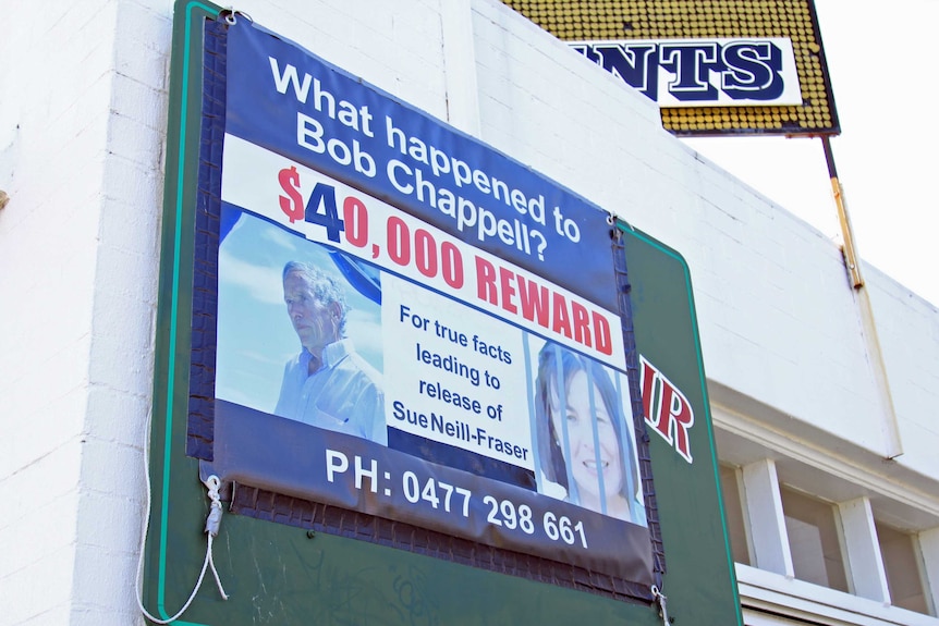 A billboard advertising a reward for 'true facts' leading to the truth about the death of Bob Chappell