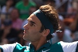 Roger Federer volleys at the US Open