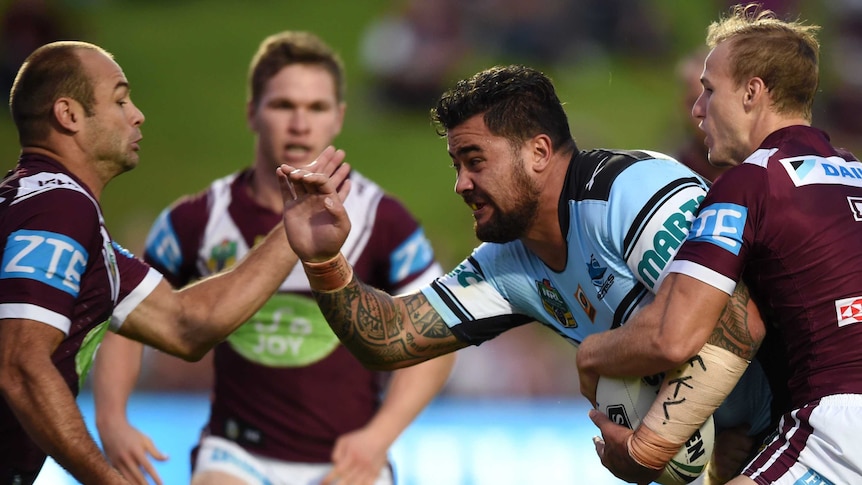 Andrew Fifita (centre) wears an armband with the letters FKL during a round 3 match in Sydney.