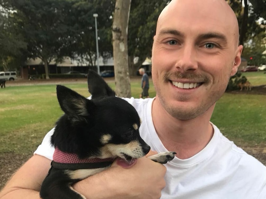 Chris Csabs pictured with a dog.
