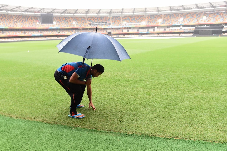 Bangladesh captain Mashrafe Mortaza checks out the Gabba surface