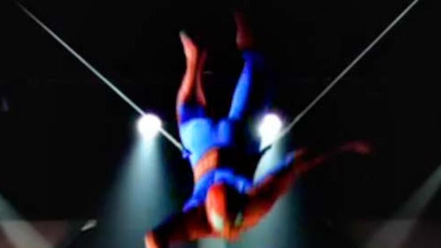 Spider-Man swings through the air