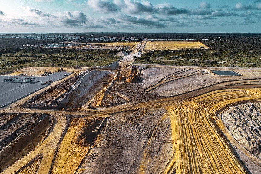 An aerial shot of construction of the future Alkimos station, as part of the Yanchep rail extension.