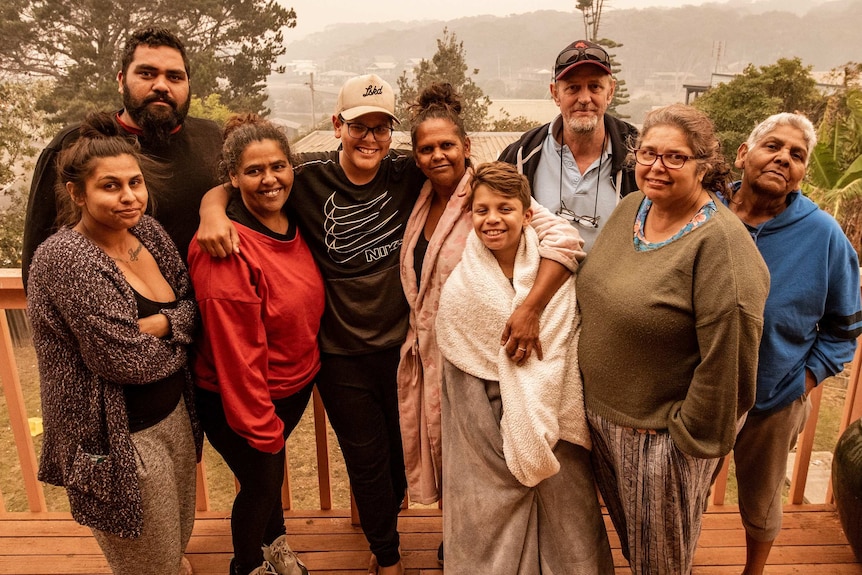 Alice Patten and eight of the 17 family members staying at her house.