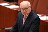 Senator George Brandis addressing the Senate