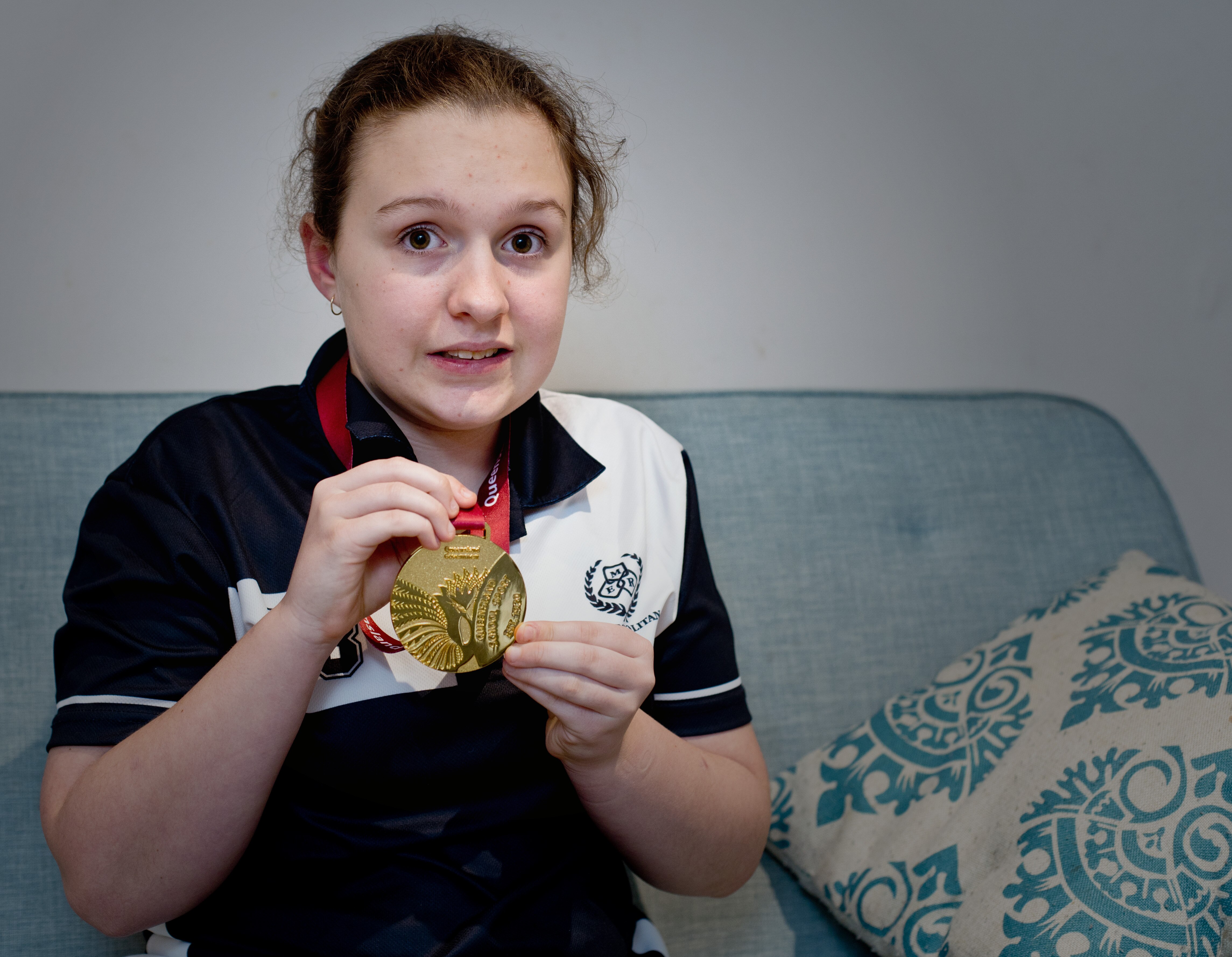 Charlotte Kanowski holds her medal