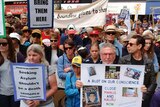 Canberrans rally in Garema Place demanding better treatment of asylum seekers.