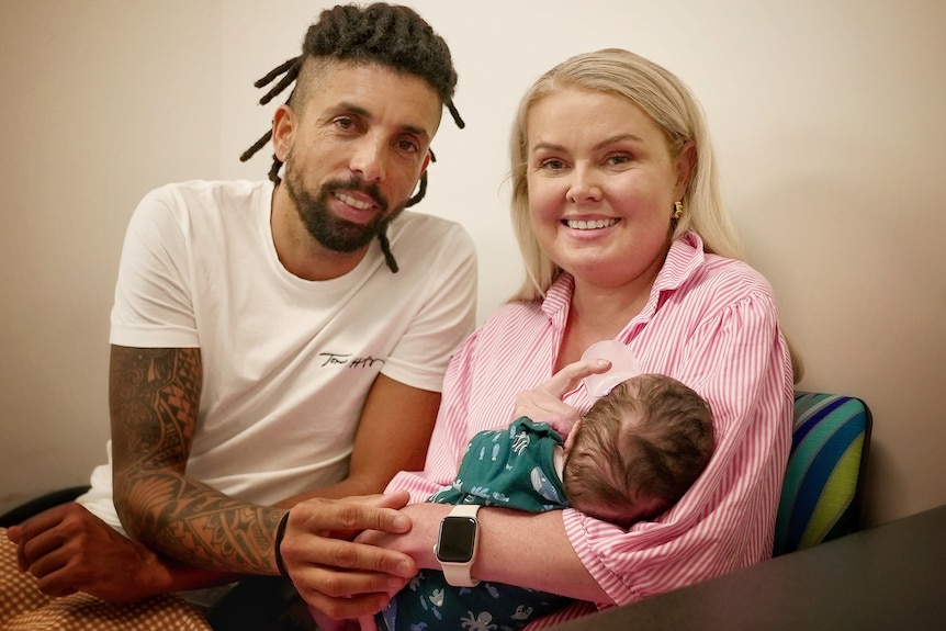 Proud parents Tina Lee and Tom Bueno with baby Henry