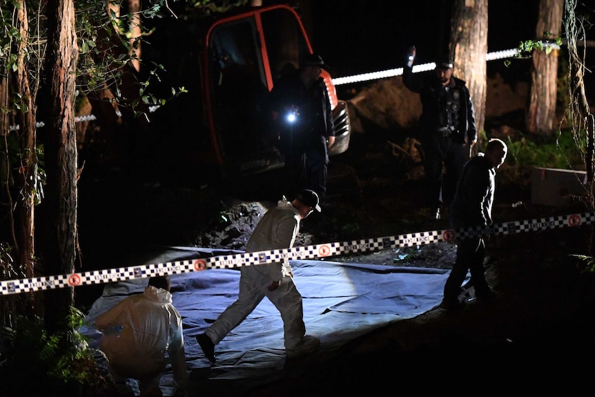 Police cover the site where remains found