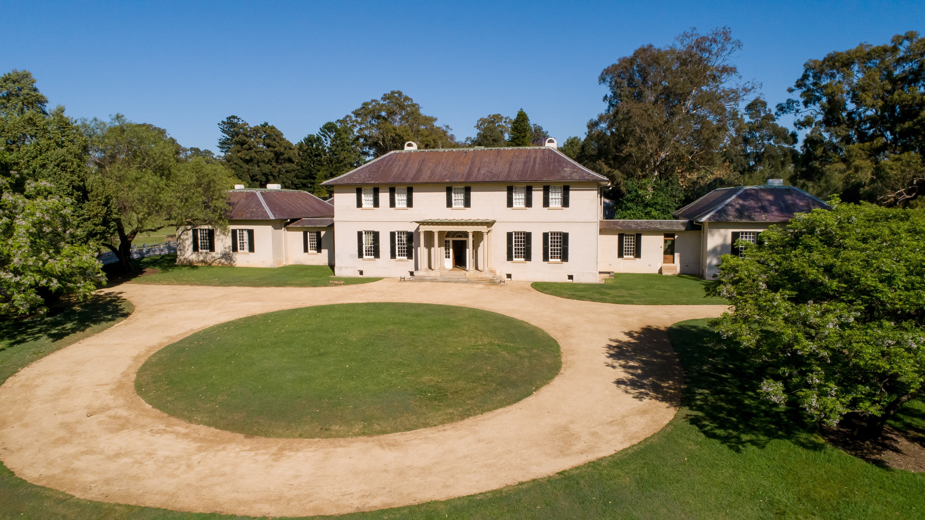 Exterior of building with oval driveway