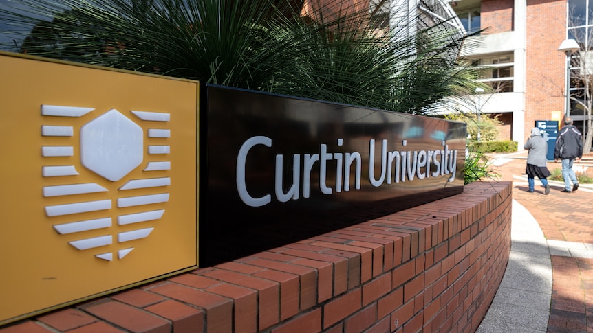 A sign at the entrance to Curtin University